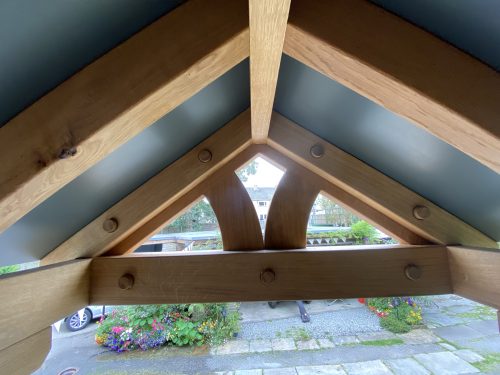 Solid oak porch canopy by TF Building and Renovations
